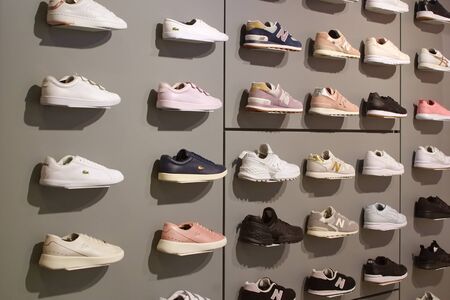Saint Petersburg, Russia - March 02, 2019: Sneakers of different brands on display in the store