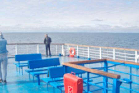 Blurred image of people on the deck of the shipの写真素材