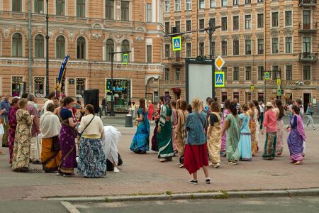 Saint Petersburg, Russia - July 28, 2019: Performance with hare Krishna dances on a city street
