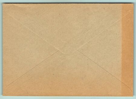 The image of an old yellowed envelope as the background.の写真素材