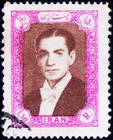 Saint Petersburg, Russia - February 01, 2020: Stamp issued in the Iran with the image of the Mohammad Reza Shah Pahlavi, circa 1956のeditorial素材