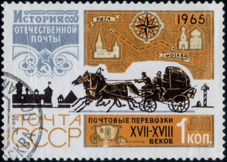 Saint Petersburg, Russia - February 20, 2020: Postage stamp issued in the Soviet Union with the image of the first public postal route Moscow-Riga. From the series on History of the Russian Post, circa 1965のeditorial素材
