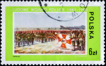 Saint Petersburg, Russia - February 20, 2020: Stamp issued in the Poland with the image of the Troop formation. From the series on Polish Peoples Army, 40th Anniversary, circa 1983のeditorial素材