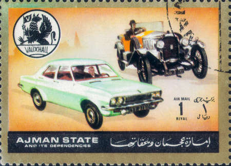 Saint Petersburg, Russia - March 06, 2020: Stamp issued in the Ajman with the image of old and antique Vauxhall cars. From the series on Automobiles, now and then, circa 1972のeditorial素材