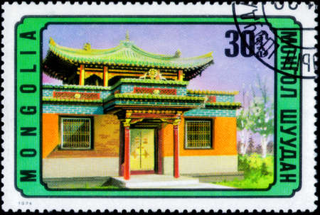 Saint Petersburg, Russia - March 06, 2020: Stamp issued in the Mongolia with the image of the Entrance to Charity Temple, Ulan Bator. From the series on Mongolian Architecture, circa 1974のeditorial素材