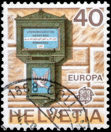 Saint Petersburg, Russia - May 17, 2020: Stamp printed in the Switzerland with the image of the Letterbox of Basel, circa 1979のeditorial素材