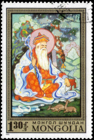 Saint Petersburg, Russia - May 17, 2020: Stamp printed in the Mongolia with the image of The Old sage with animals, circa 1972のeditorial素材