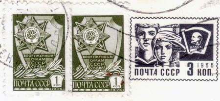 Saint Petersburg, Russia - March 15, 2020: Postage stamps issued in the Soviet Union depicting the Order of Labour Glory, 1st class, circa 1976のeditorial素材
