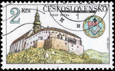 Saint Petersburg, Russia - May 17, 2020: Stamp printed in the Czechoslovakia with the image of the coat of arms of Trenchin, circa 1982のeditorial素材