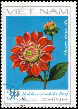 Saint Petersburg, Russia - May 31, 2020: Stamp printed in the Vietnam with the image of the Red Dahlia, circa 1982のeditorial素材