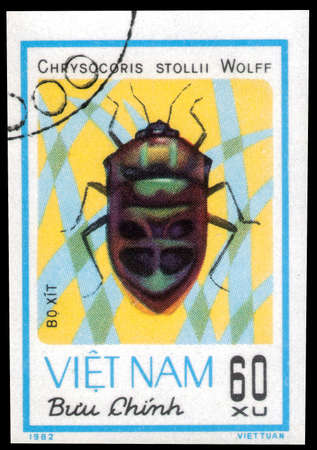 Saint Petersburg, Russia - May 31, 2020: Stamp printed in the Vietnam with the image of the Shield-backed Bug, Chrysocoris stollii, circa 1982のeditorial素材