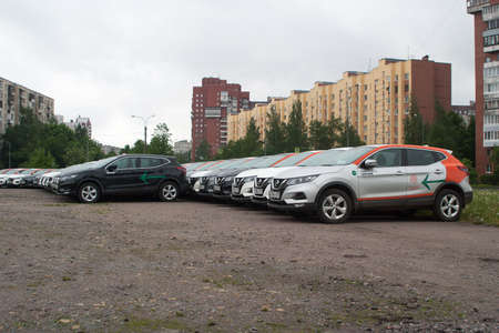 Saint Petersburg, Russia - June 06, 2020: Nissan Qashqai carsharing company YouDrive cars parked in a vacant lot during restrictions due to the epidemic.のeditorial素材