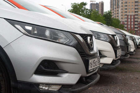 Saint Petersburg, Russia - June 06, 2020: Nissan Qashqai carsharing company YouDrive cars parked in a vacant lot during restrictions due to the epidemicのeditorial素材