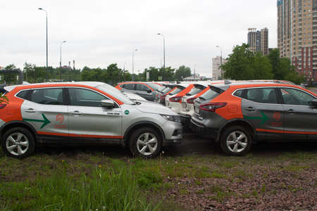 Saint Petersburg, Russia - June 06, 2020: Youdrive carsharing company cars parked in a vacant lot during restrictions due to the epidemicのeditorial素材