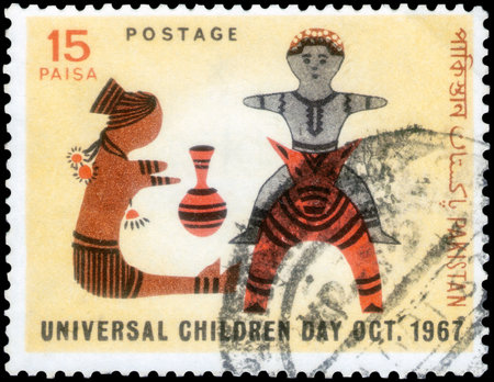 Saint Petersburg, Russia - November 12, 2020: Postage stamp issued in the Pakistan with the image of Clay Toys. From the series on Universal Childrens Day, circa 1967のeditorial素材