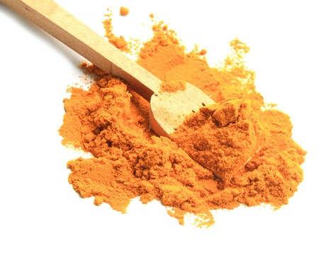 turmeric powder with wood spponの写真素材