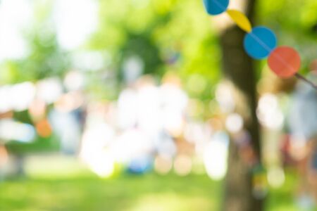Blur Park garden Tree in nature background on holiday, blurred green bokeh light outdoor summer backgroundの写真素材