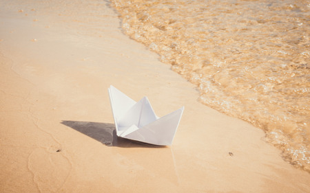 Romance in soft pastel colors. Toy paper boat