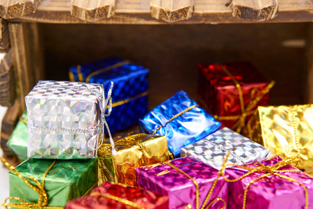 Colorful gift box drop off wood crateの写真素材