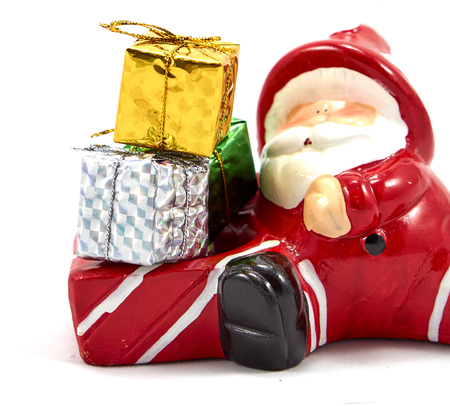 Decoration santa claus with colorful gift boxの写真素材