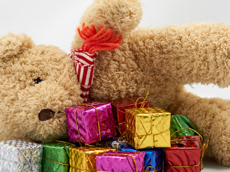 Colorful decoration gift box with teddy bearの写真素材