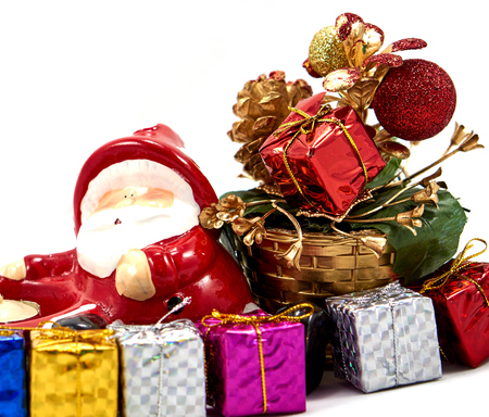 Decoration santa claus with gift box and christmas treeの写真素材