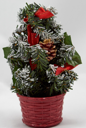 Decoration christmas tree with cone and ribbonの写真素材