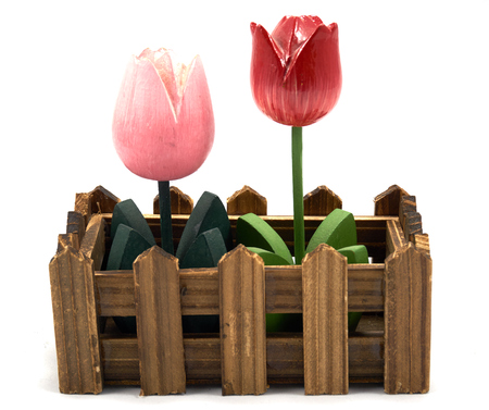 Decoration pink and red wood flower in fenceの写真素材