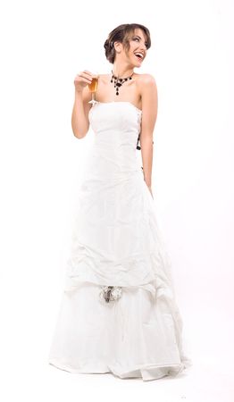 Happy bride with glass of champagneの写真素材