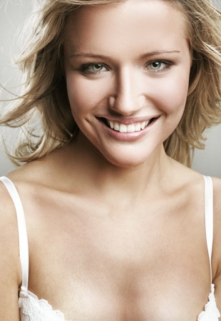 Portrait of a smiling blonde の写真素材
