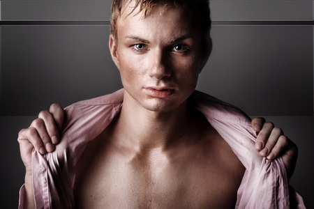 Studio portrait of a young confident man の写真素材