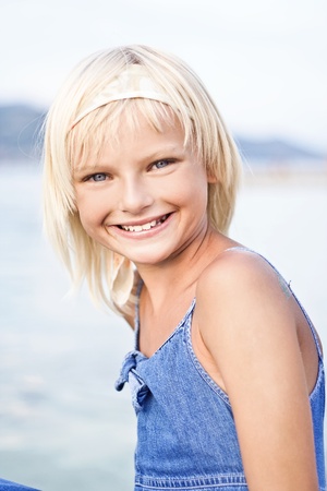 Young blond girl smilingの写真素材