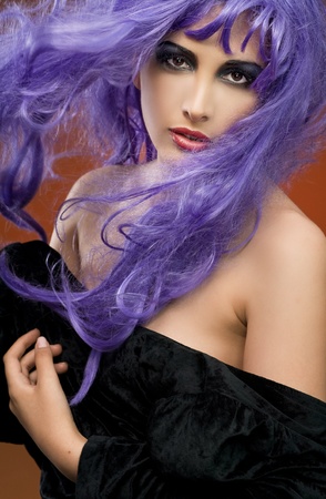 Studio photo of a young astonished beauty の写真素材