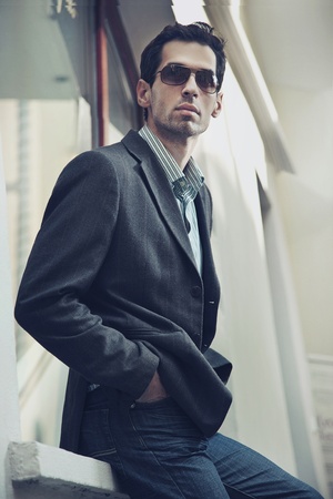 Young fashionable man posingの写真素材