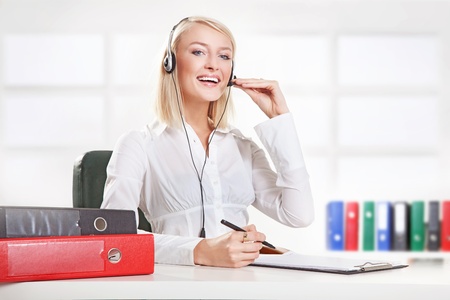 Cheerful female call centre employeeの写真素材