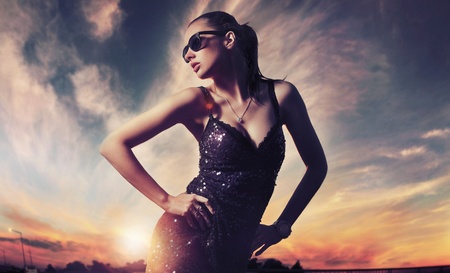 Perfect fashionable lady wearing sunglasses