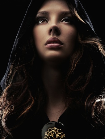 Portrait of a young woman in hoodの写真素材