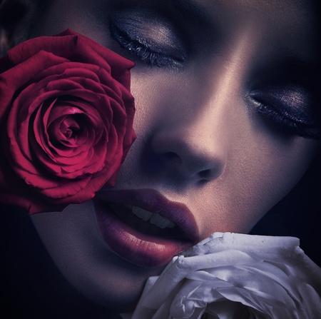 Portrait of a woman's face with rosesの写真素材