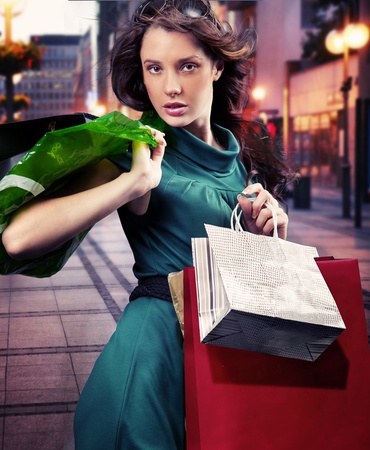 Young beauty brunette shoppingの写真素材