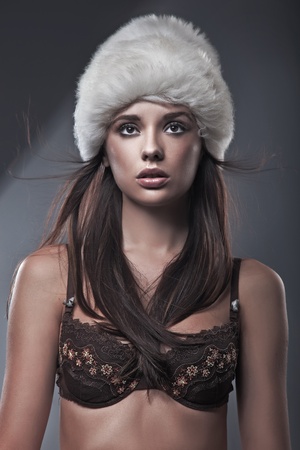 Beauty brunette in white hatの写真素材