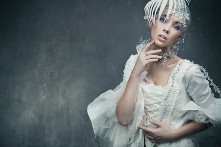 Beauty brunette wearing fashionable dressの写真素材