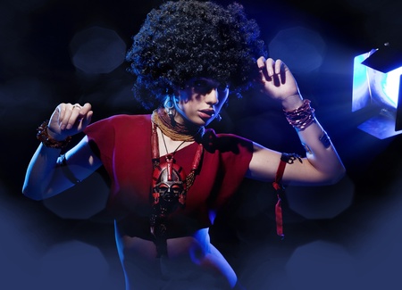 Beautiful woman with huge afro haircutの写真素材