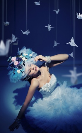 Winter woman with origamiの写真素材