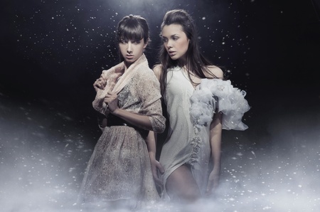 Two beautiful sensual girls posing の写真素材