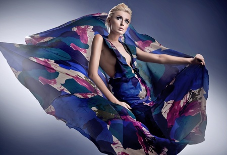 Beautiful blonde woman in georgeus dressの写真素材