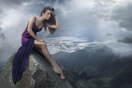Perfect brunette beauty on a mountainの写真素材