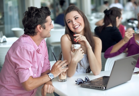 Loving couple in a restaurantの写真素材
