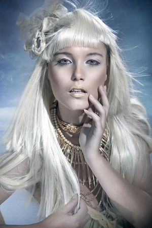 Attractive blond beauty in winter sceneryの写真素材