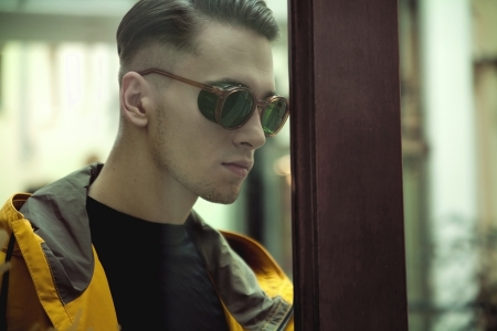 Profile portrait of a cute modern guyの写真素材