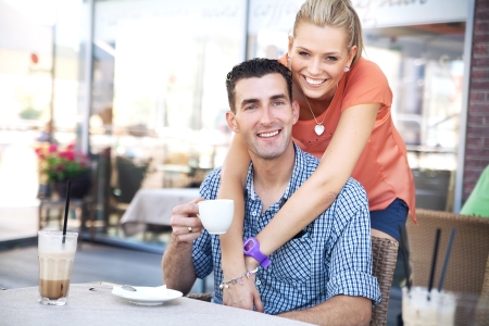 Photo of relaxed couple in coffee shopの写真素材